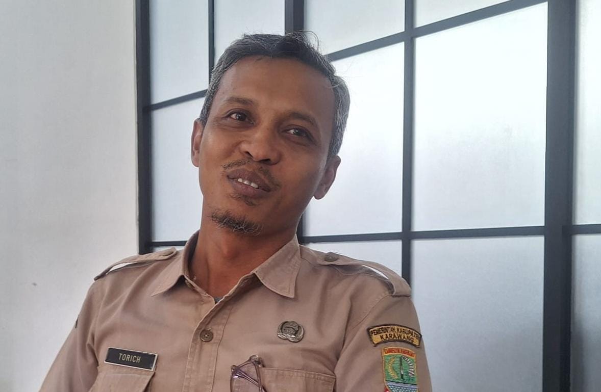 Kabid Adminduk Disdukcapil Karawang Torich Haerachman, S.T, menejelaskan program layanan Tarik Data dan X-Men. (ist)